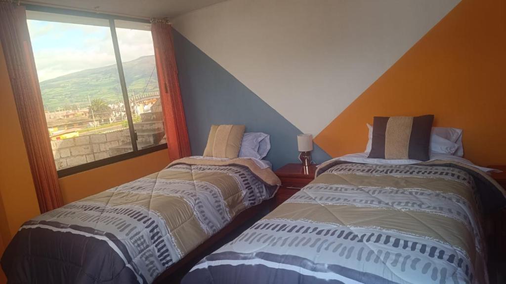 Postel nebo postele na pokoji v ubytování LULU HOUSE