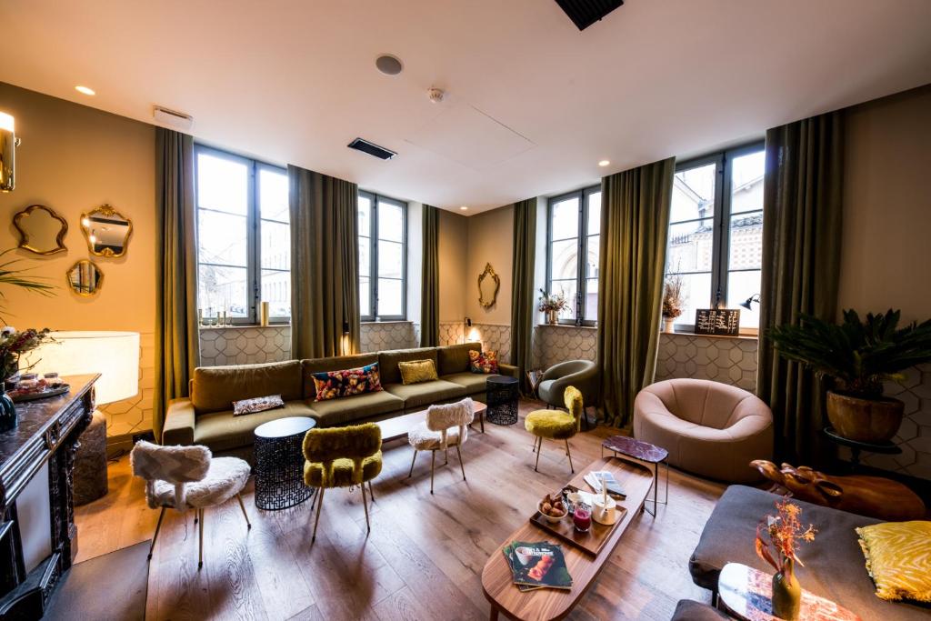 Posezení v ubytování Hôtel de l'Abbaye Lyon - Boutique Hôtel