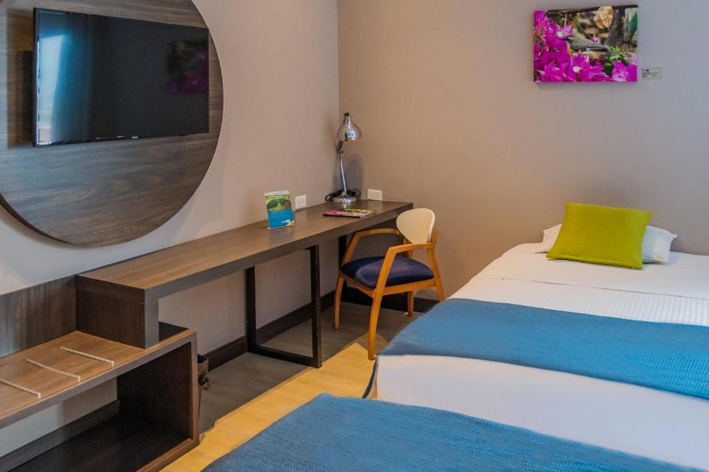 Postel nebo postele na pokoji v ubytování Hotel F25