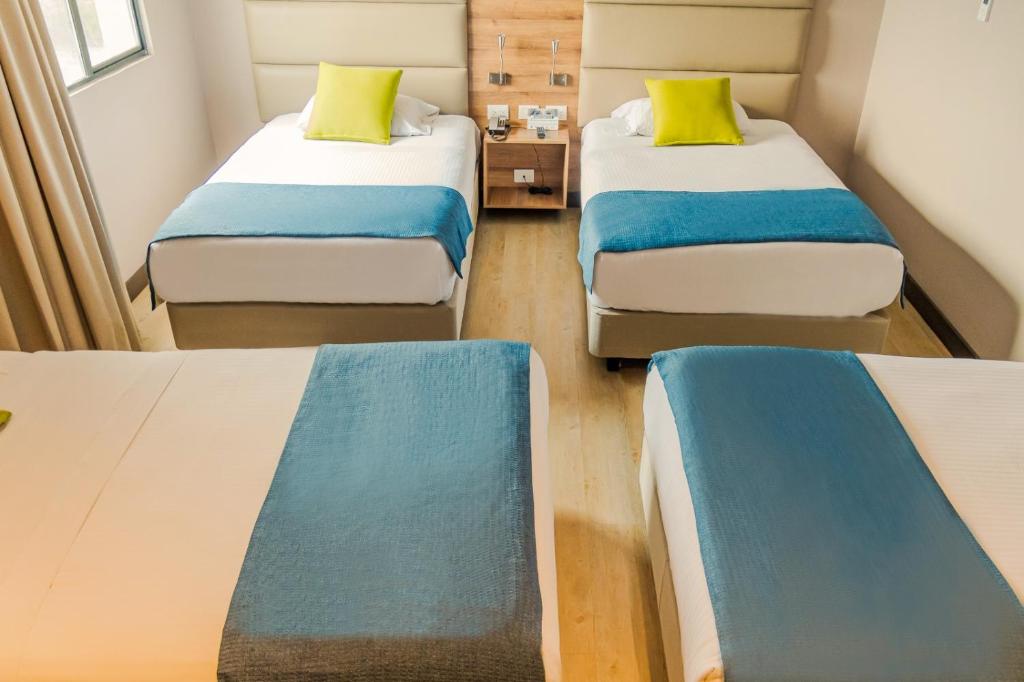 Postel nebo postele na pokoji v ubytování Hotel F25