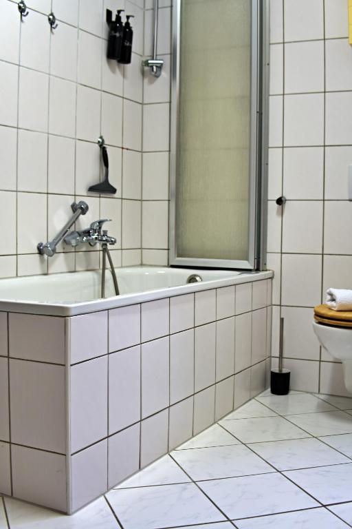 Koupelna v ubytování Industrial Style 77qm mit Balkon