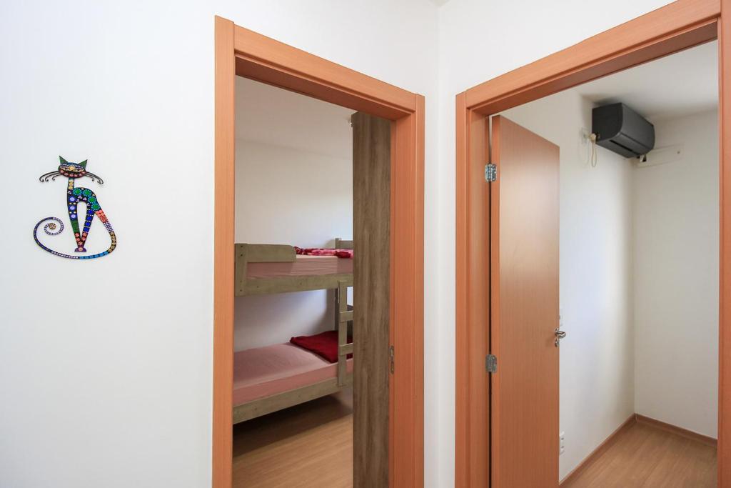 Postel nebo postele na pokoji v ubytování Ap Cloe com piscina próximo ao Aeroporto