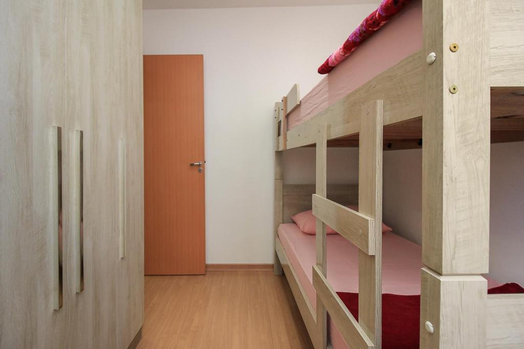 Postel nebo postele na pokoji v ubytování Ap Cloe com piscina próximo ao Aeroporto