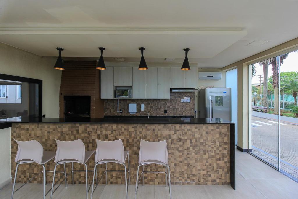 Kuchyň nebo kuchyňský kout v ubytování Ap Cloe com piscina próximo ao Aeroporto