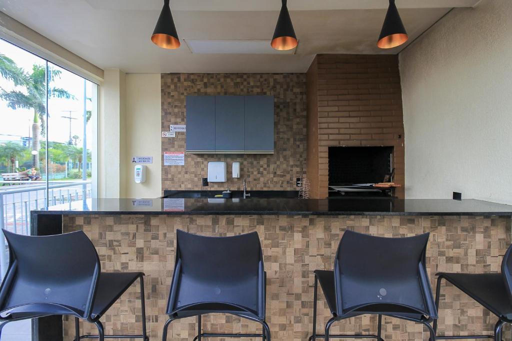Kuchyň nebo kuchyňský kout v ubytování Ap Cloe com piscina próximo ao Aeroporto