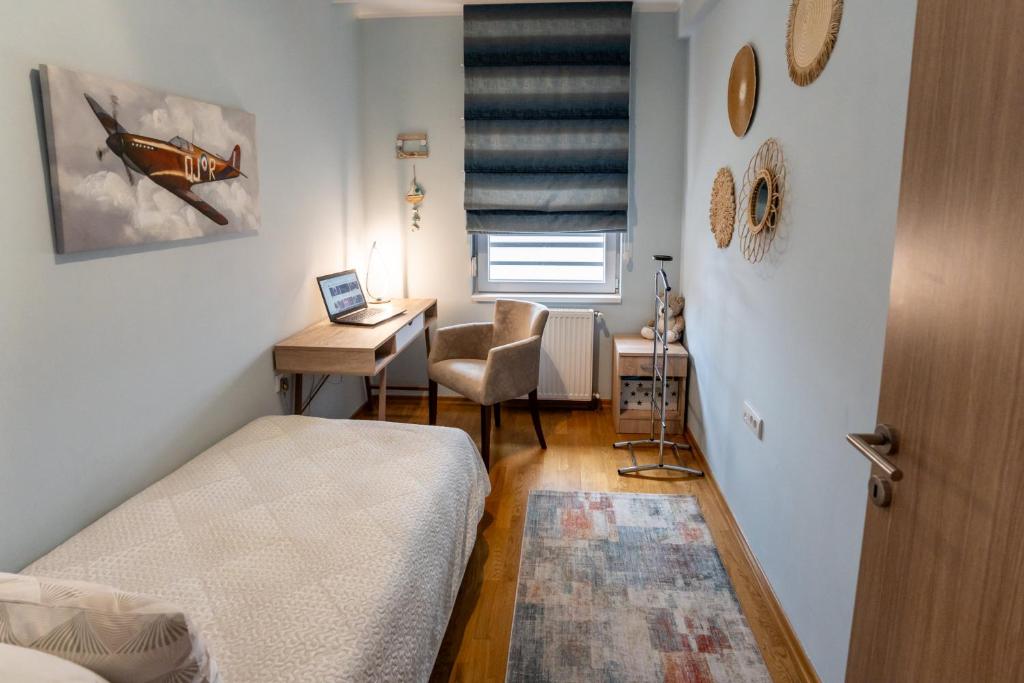 Postel nebo postele na pokoji v ubytování Apartman AuRa