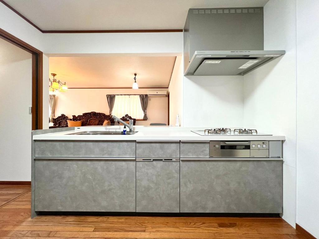 Kuchyň nebo kuchyňský kout v ubytování Kenki Kawaguchi House