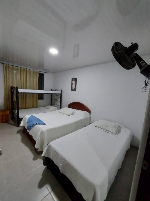 Postel nebo postele na pokoji v ubytování casa de campo el rincón del paraíso
