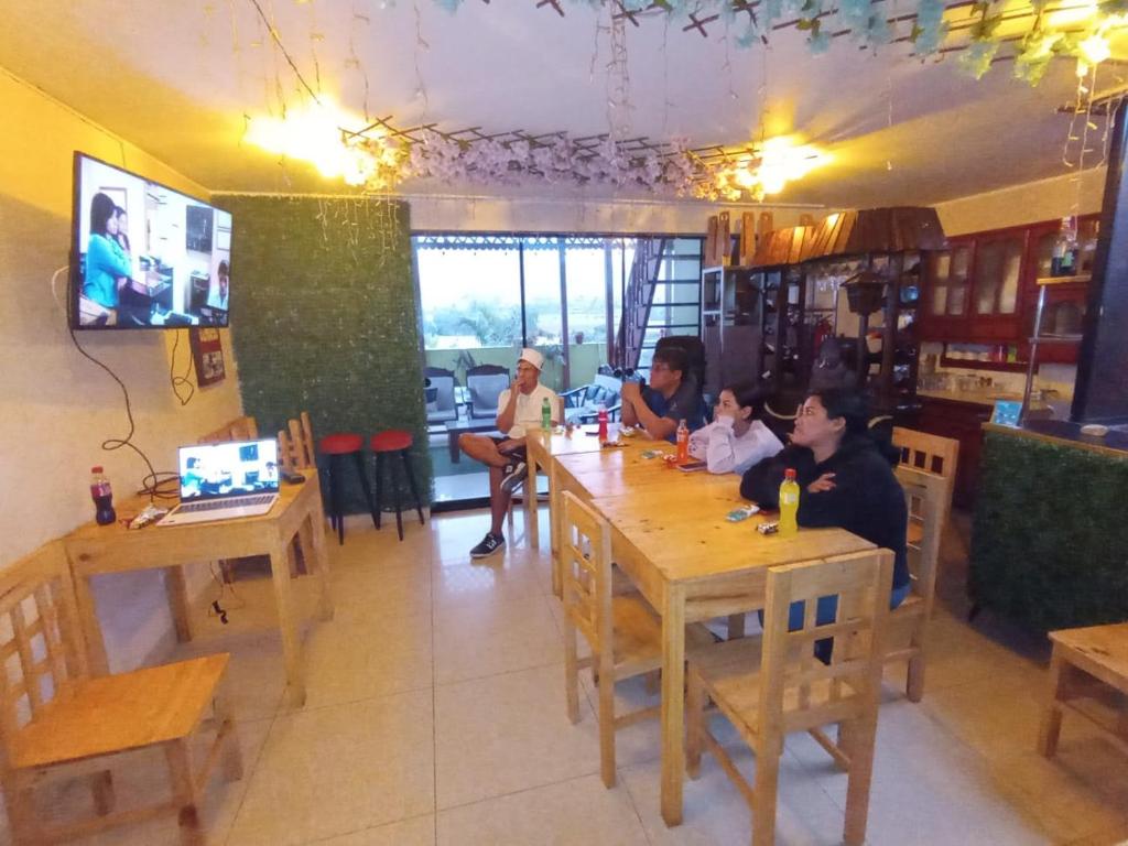 TV a/nebo společenská místnost v ubytování Hostal Milagros