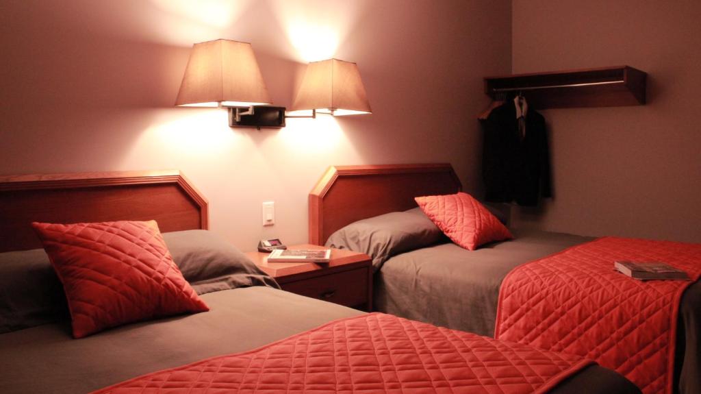 Postel nebo postele na pokoji v ubytování Hôtel Val-des-Sources
