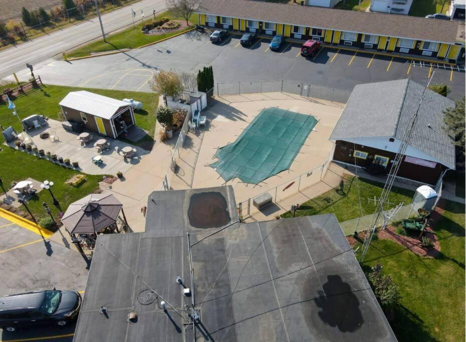 an aerial view of a parking lot with a pool at #17 Snooze in Wisconsin Rapids