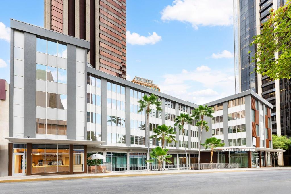 a rendering of a building with palm trees at AC Hotel by Marriott Honolulu in Honolulu