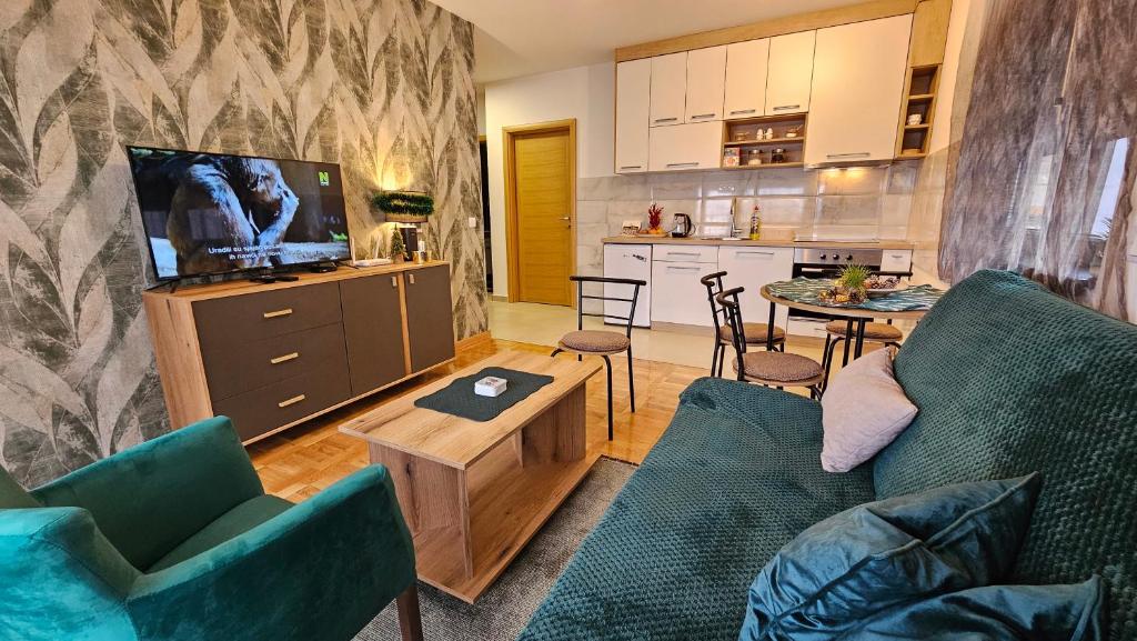 Η κουζίνα ή μικρή κουζίνα στο Apartman 01