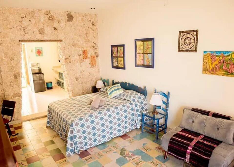 Postel nebo postele na pokoji v ubytování Casa Chaak Maya