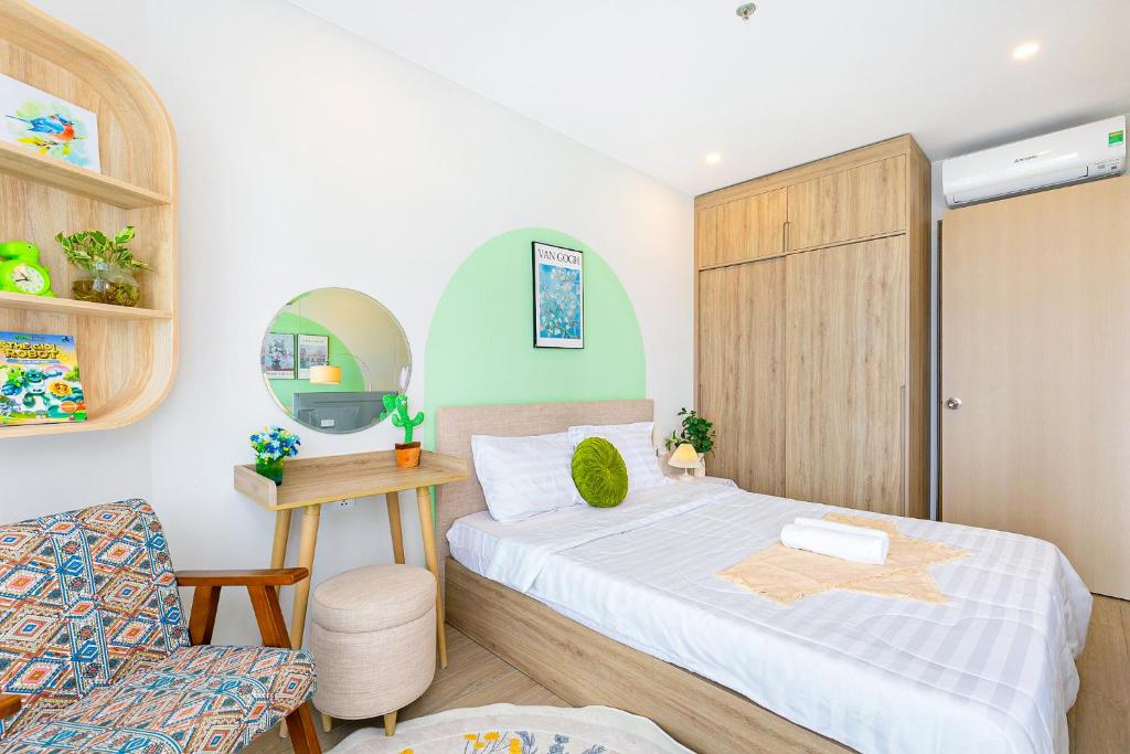 Giường trong phòng chung tại The Sóng Apartment Vũng Tàu - Căn Hộ Hồ Bơi-Olive Homestay