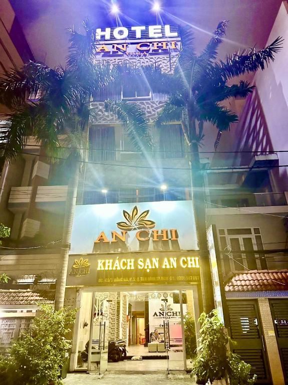 a hotel sign on the front of a building at Khách sạn An Chi in Ho Chi Minh City