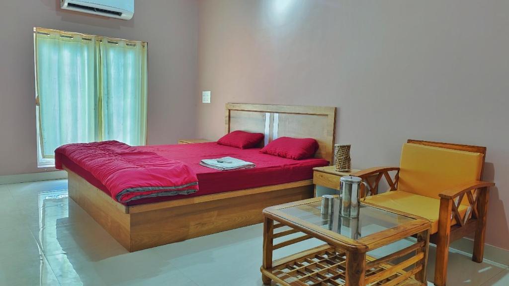 Postel nebo postele na pokoji v ubytování AYM Yoga Resort Arambol GOA