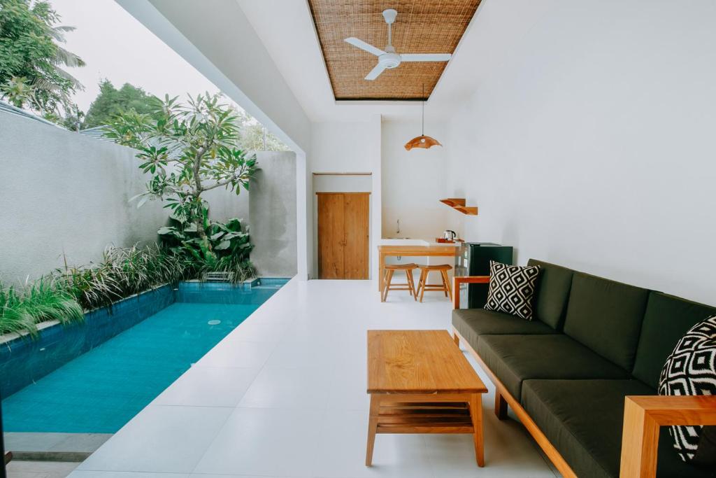 Posezení v ubytování Mahayoga Ubud Private Pool Villa Spa And Resto