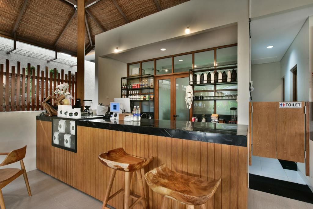 Lounge nebo bar v ubytování Mahayoga Ubud Private Pool Villa Spa And Resto