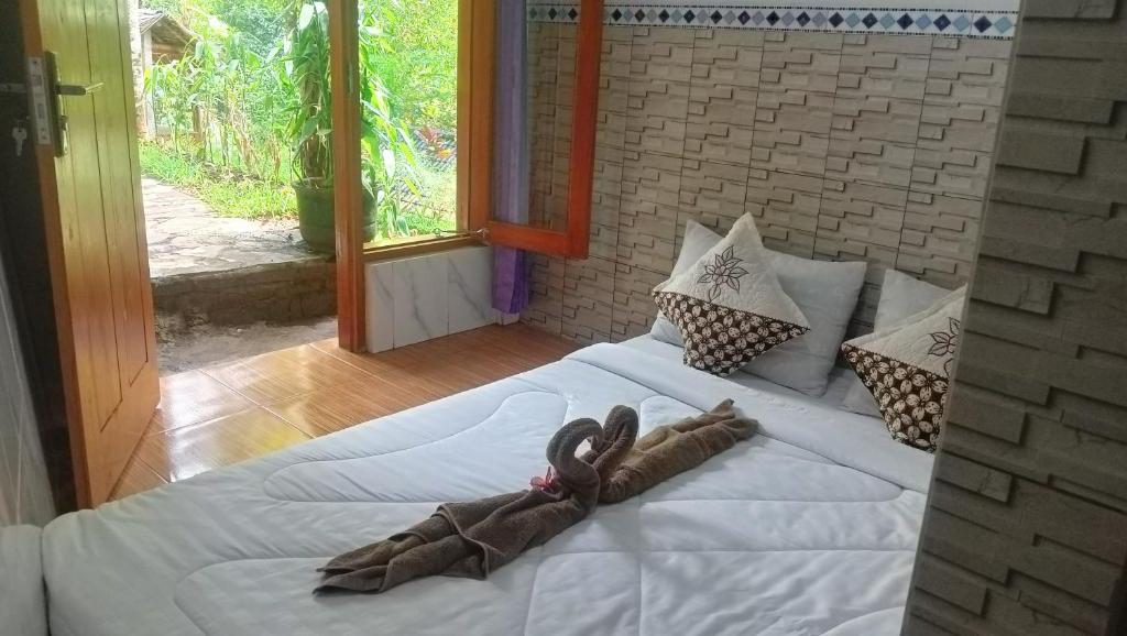 Buda's Homestay Lemukih - Family Room With Garden View