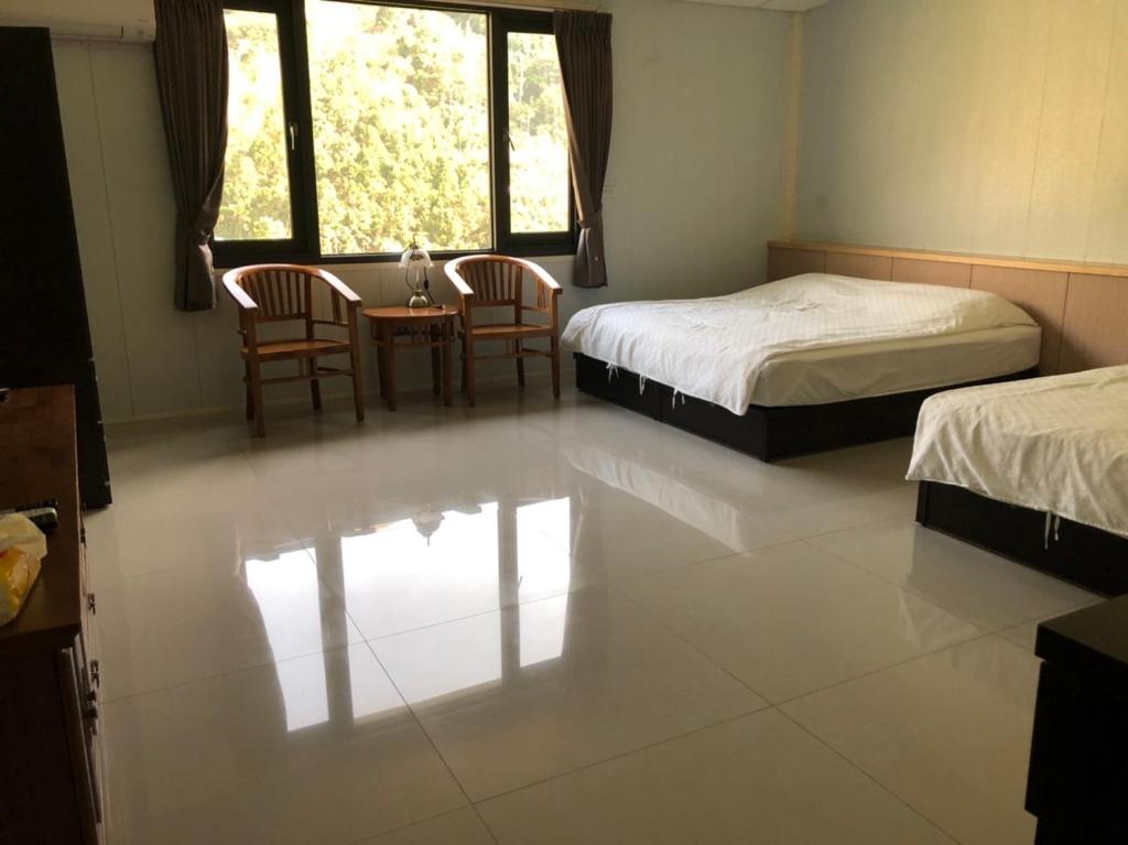 Postel nebo postele na pokoji v ubytování Bao Chi B&B