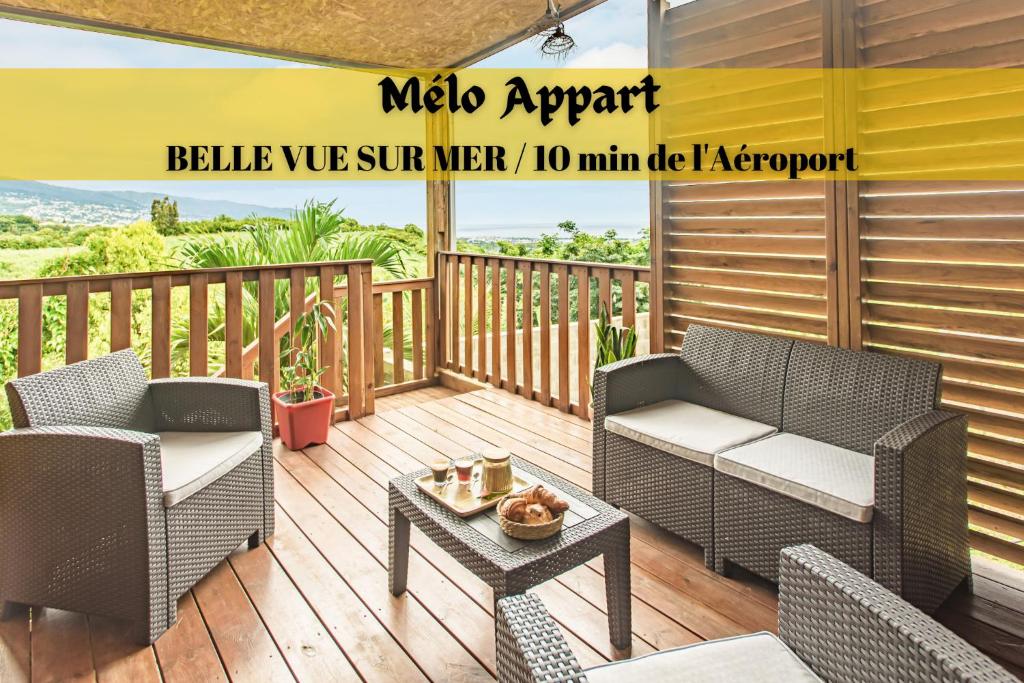 Kuvagallerian kuva majoituspaikasta Mélo Appart avec sa terrasse spacieuse et vue entre Mer & montagne, joka sijaitsee kohteessa Sainte-Marie
