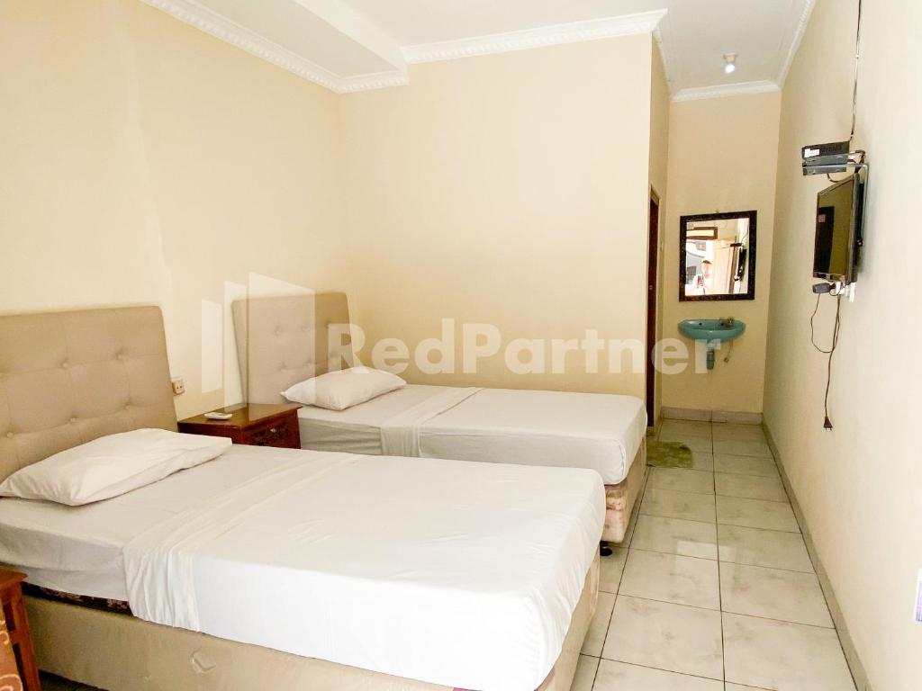 Hotel Kurnia @ Jln Pemuda Blora RedPartner - Chambre Lits Jumeaux De Luxe