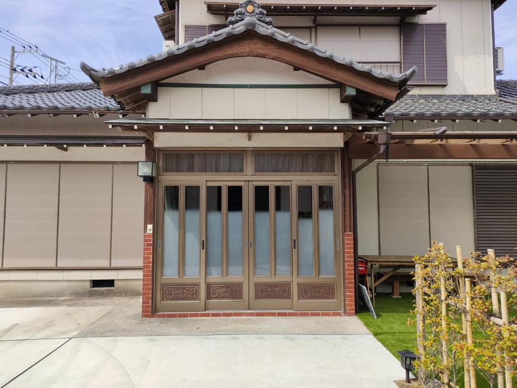 a house with a door with a roof at Tateyama City - Camp - Vacation STAY 42217v 