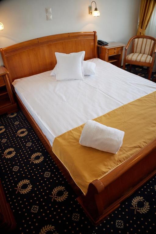 Postel nebo postele na pokoji v ubytování Hotel Belvedere
