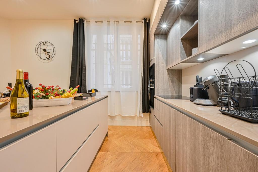 K&ouml;&ouml;k v&otilde;i k&ouml;&ouml;ginurk majutusasutuses Magnifique Appartement de luxe &amp; familial avec Parking - Paris 16