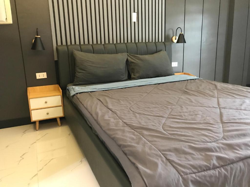 Postel nebo postele na pokoji v ubytování Clark CU Hotel