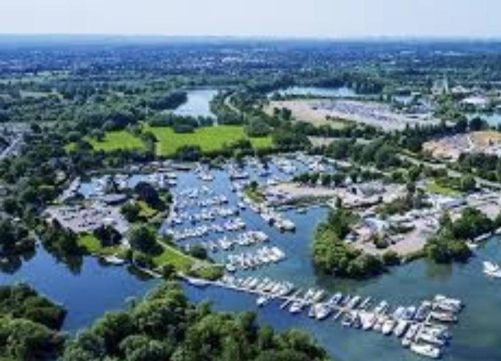 an aerial view of a marina with boats at Rhapsody in Blue in Chertsey
