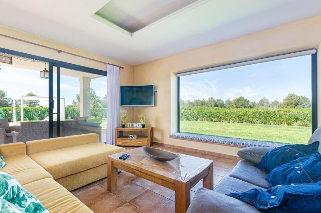 Posezení v ubytování YourHouse Romani Villa