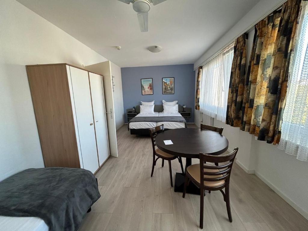 Postel nebo postele na pokoji v ubytování Primadom Aparthotel