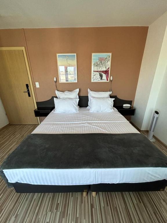 Postel nebo postele na pokoji v ubytování Primadom Aparthotel