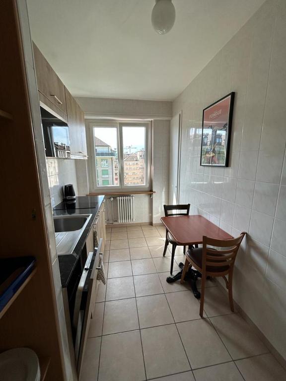 Kuchyň nebo kuchyňský kout v ubytování Primadom Aparthotel