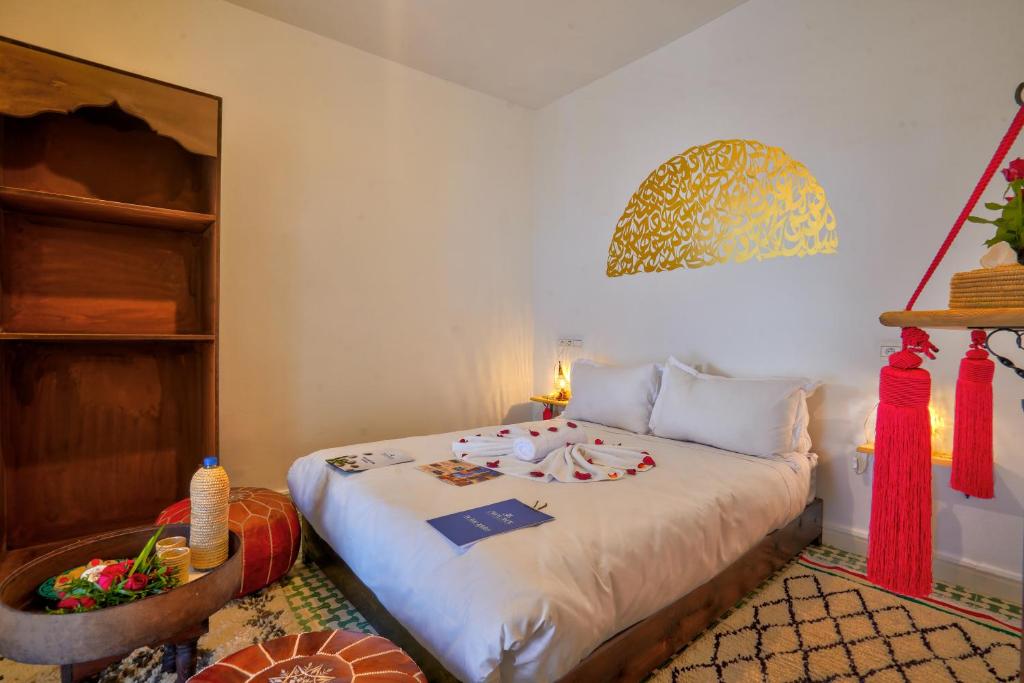 Postel nebo postele na pokoji v ubytování BÔ Riad Boutique Hotel & Spa