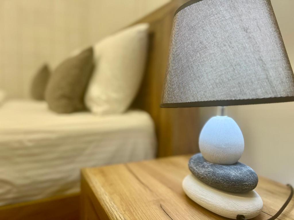Postel nebo postele na pokoji v ubytování MANSION HOTEL YEREVAN