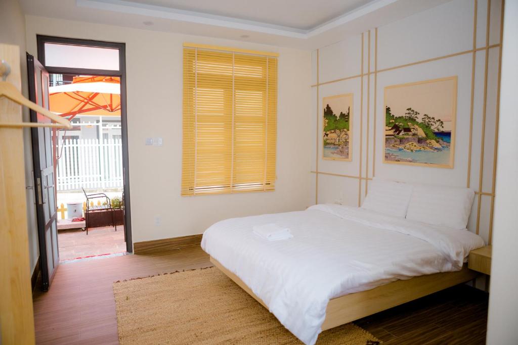 Giường trong phòng chung tại AN PHÚ Home