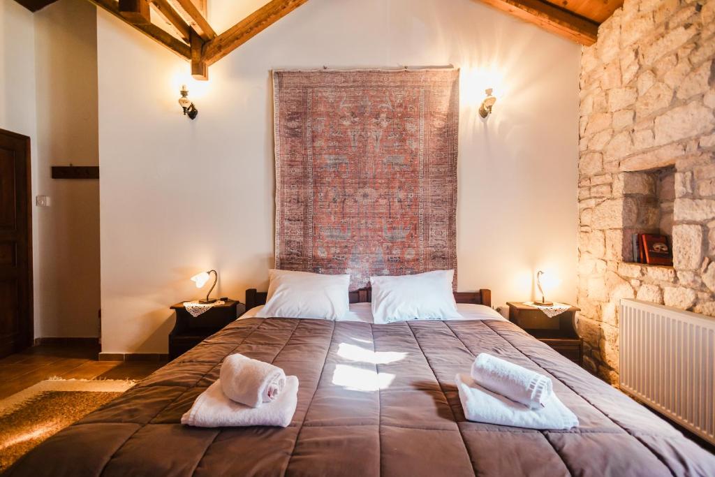 Postel nebo postele na pokoji v ubytování Guesthouse Armakas
