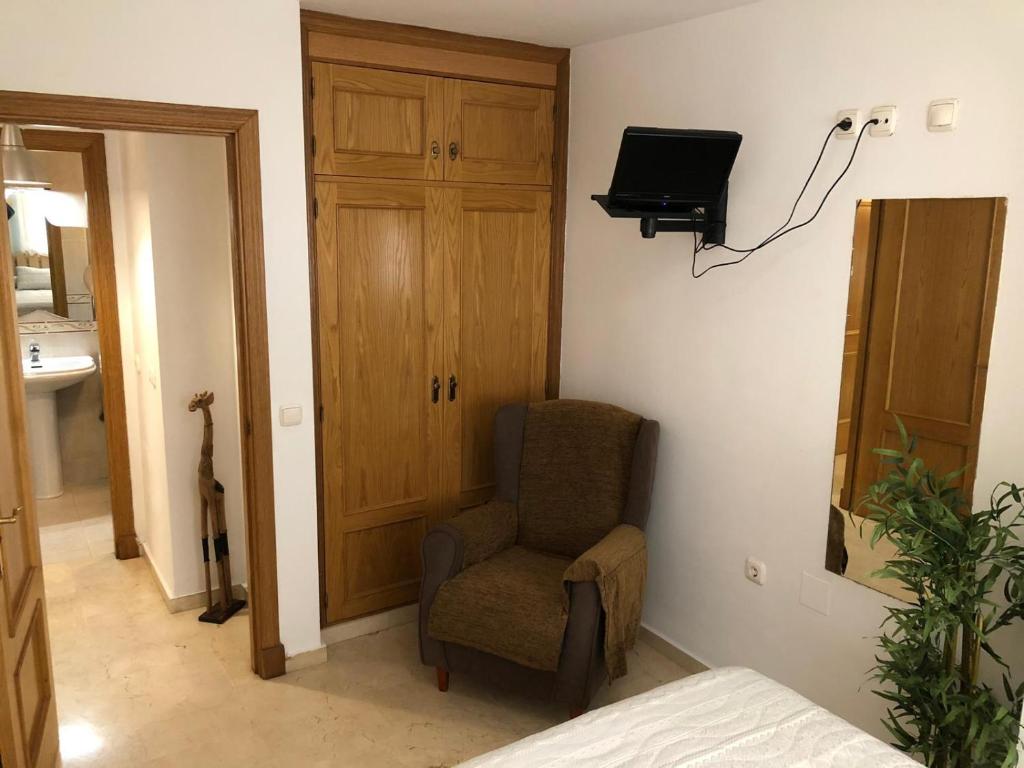 TV a/nebo společenská místnost v ubytování precioso apartamento a 50 metros de la playa