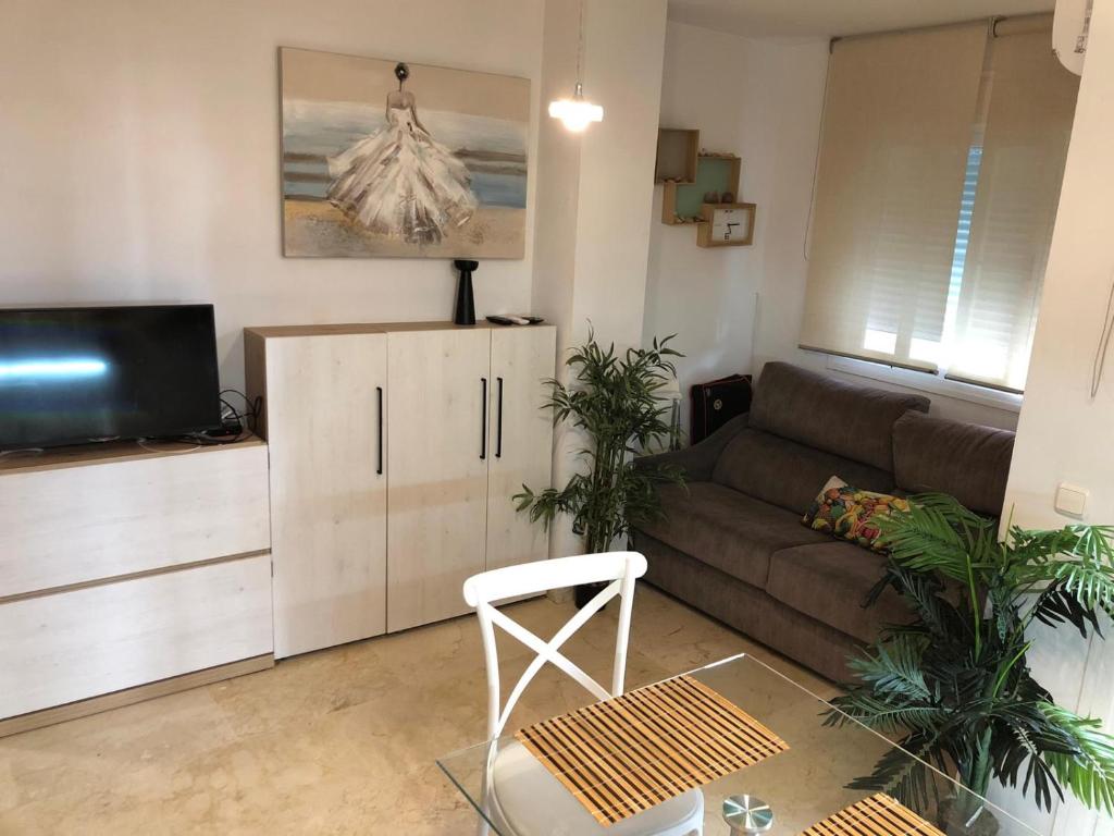 Posezení v ubytování precioso apartamento a 50 metros de la playa