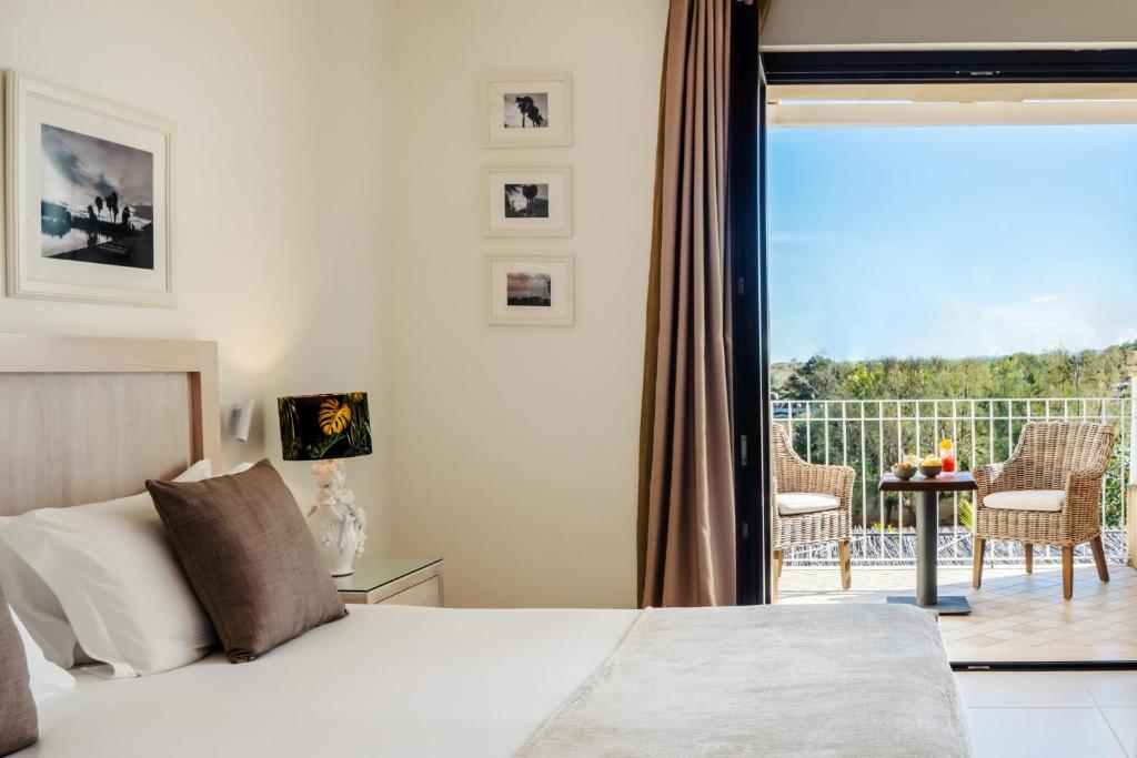Canne Bianche Lifestyle Hotelにあるベッド