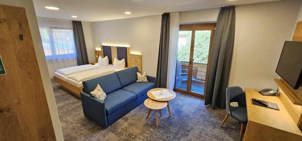 Postel nebo postele na pokoji v ubytování Hotel Seeblick