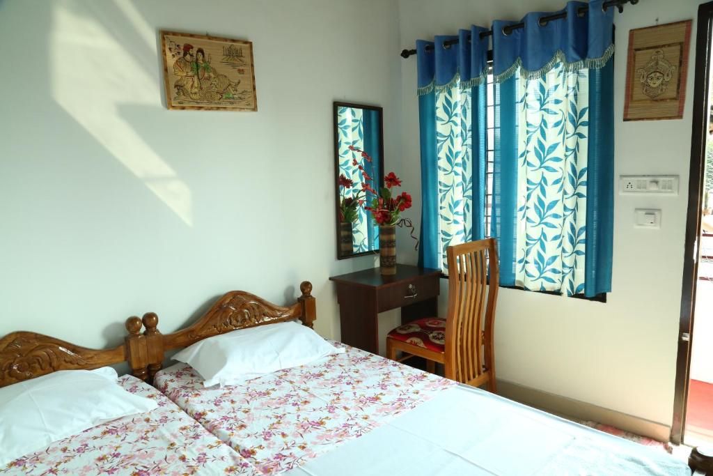 Postel nebo postele na pokoji v ubytování DreamCatcher Residency