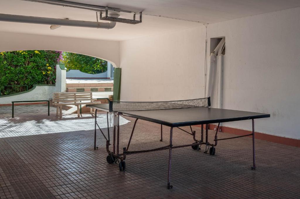 Stolní tenis v ubytování AT044 Cerca de la playa, con piscina y airco nebo okolí