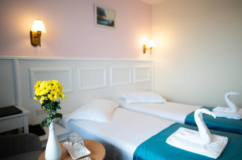 Postel nebo postele na pokoji v ubytování Hotel Parc