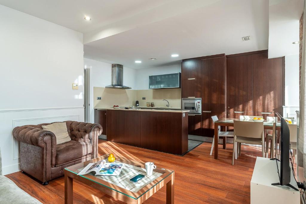 Kuchyň nebo kuchyňský kout v ubytování Enjoybcn Fira Apartment