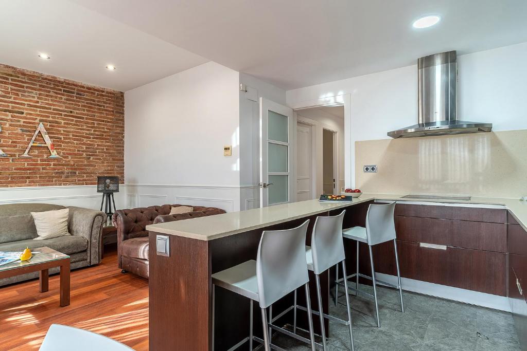 Kuchyň nebo kuchyňský kout v ubytování Enjoybcn Fira Apartment