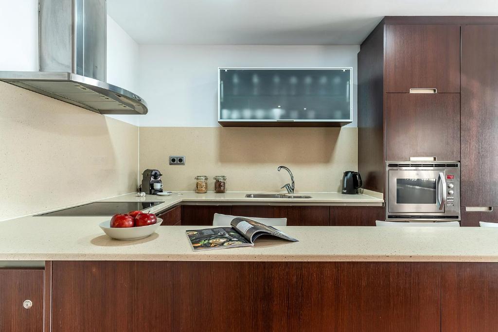 Kuchyň nebo kuchyňský kout v ubytování Enjoybcn Fira Apartment